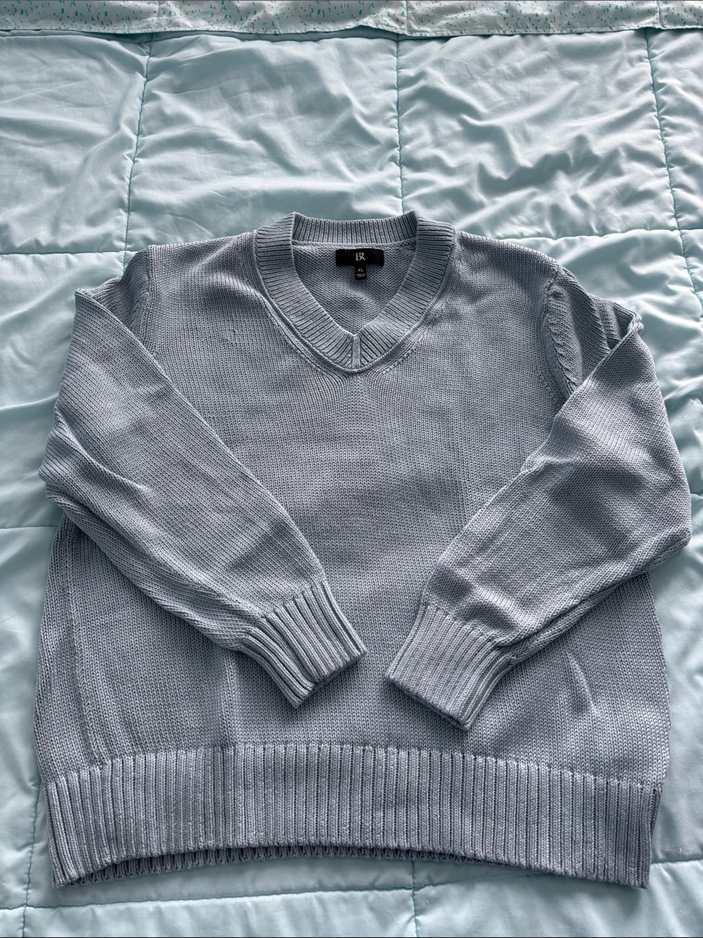 V-neck knitted sweater